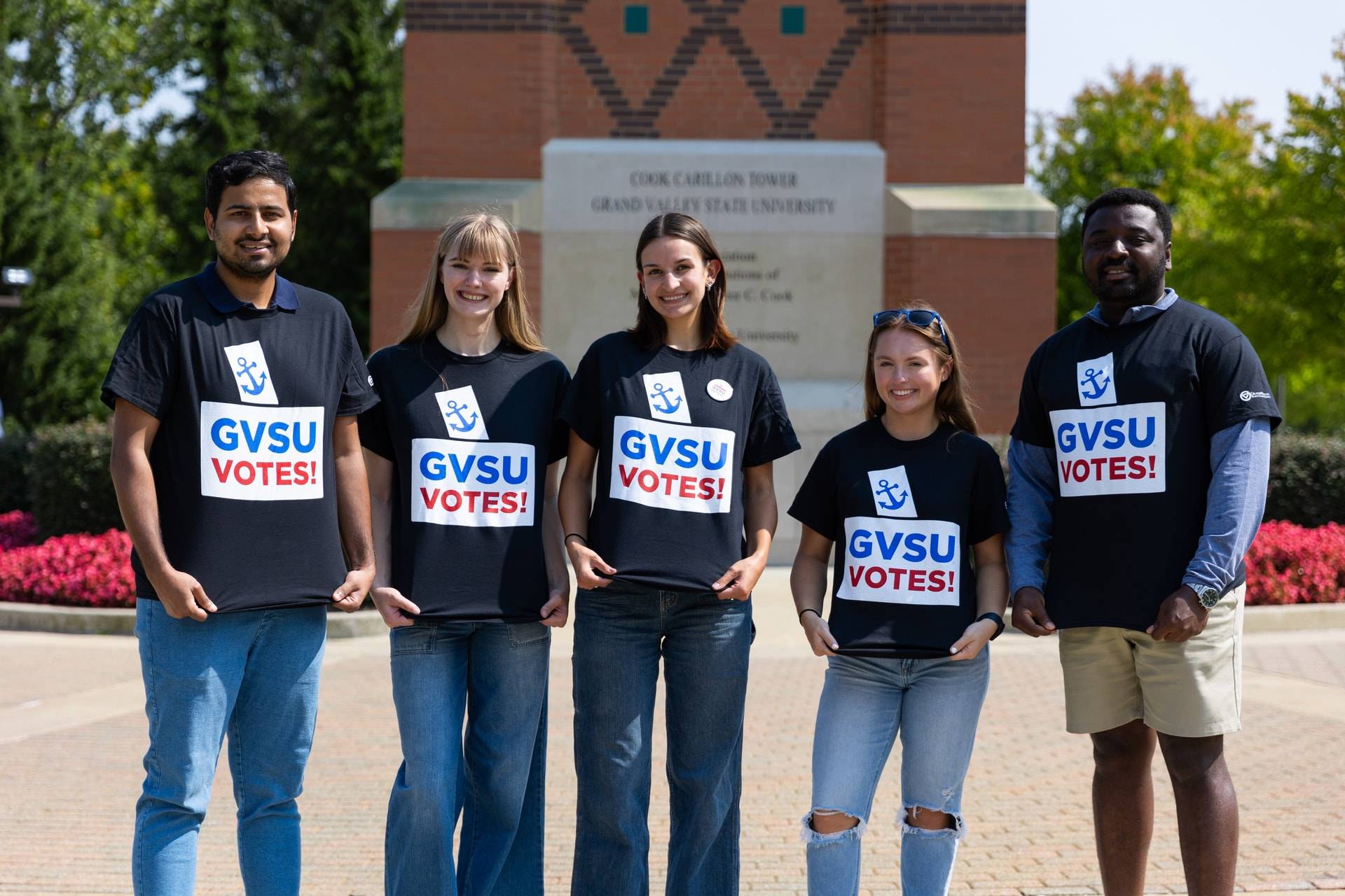 5 Students wearing black GVSU Votes T-Shirts